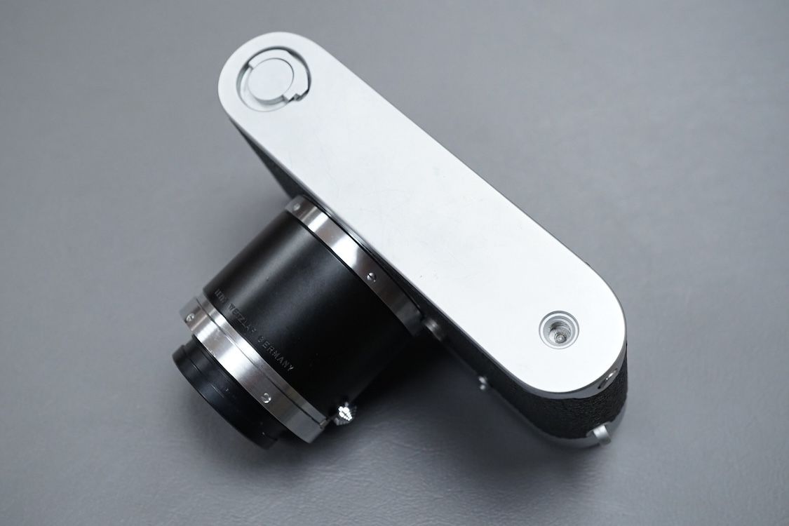 A Leica M Series MDa camera, with a Leitz 0.32:1 lens, the body stamped ‘1411519’